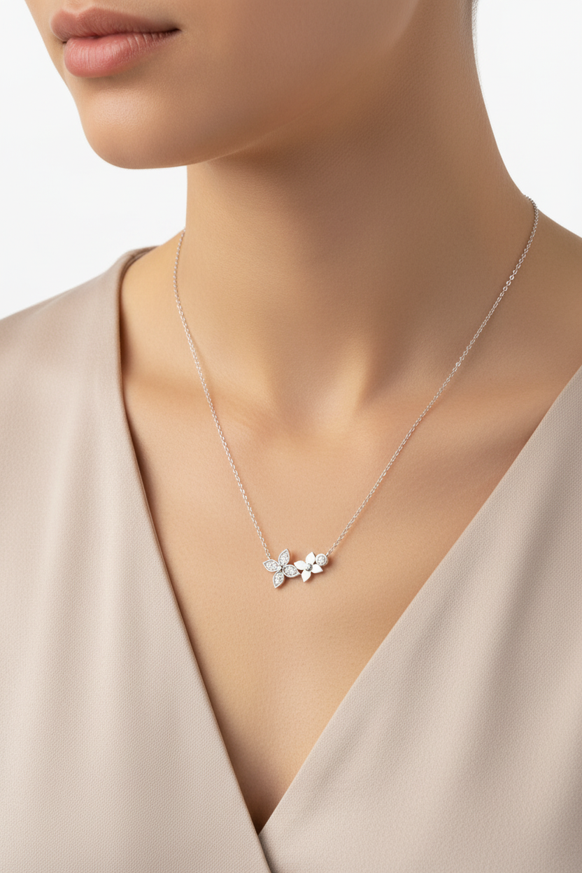 Silver butterfly necklace worn on neck