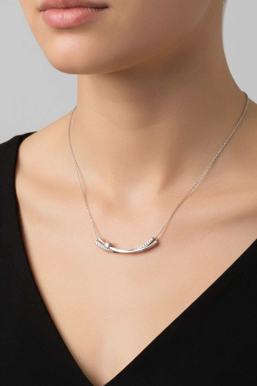 Silver curved bar necklace with diamonds on model