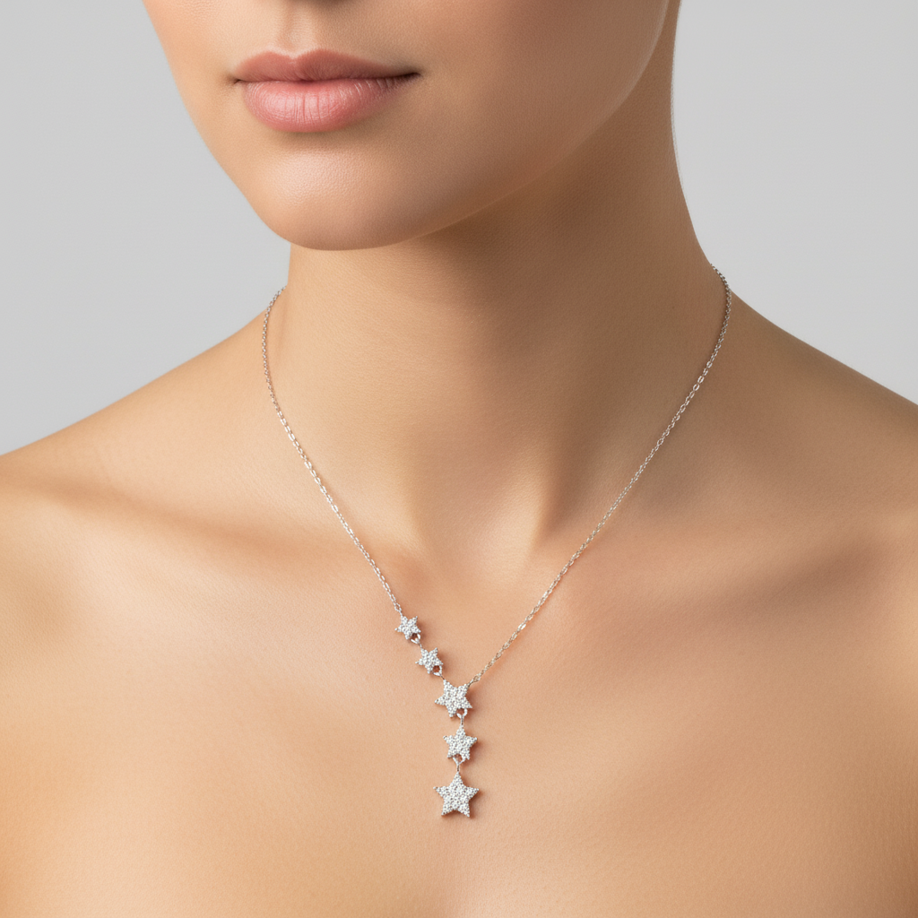 Cascading star necklace on model neck
