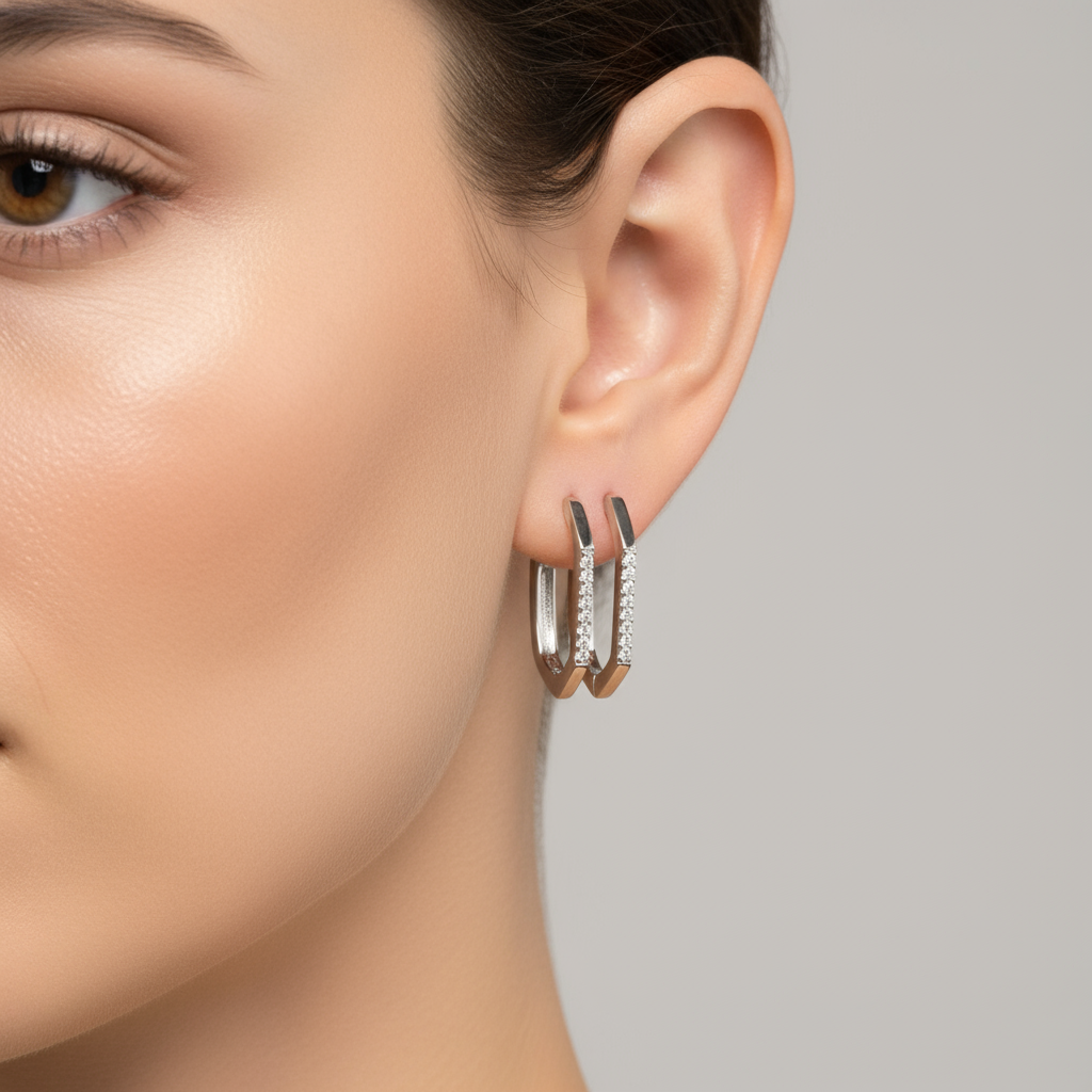 Clear CZ hoop earrings on model ear