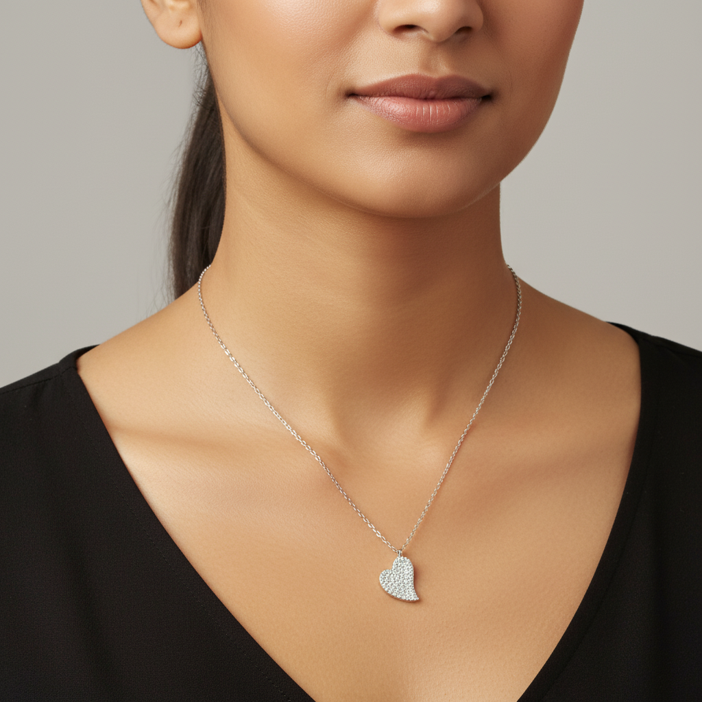 Crystal heart necklace on model neck