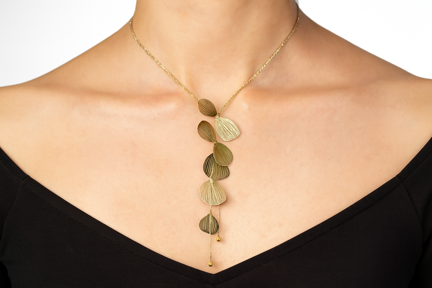 Elegant artistic pendant necklace being worn