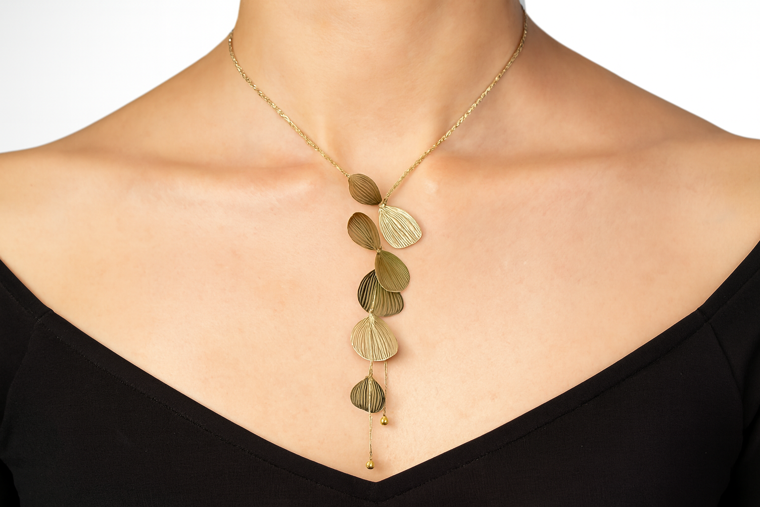 Elegant artistic pendant necklace being worn