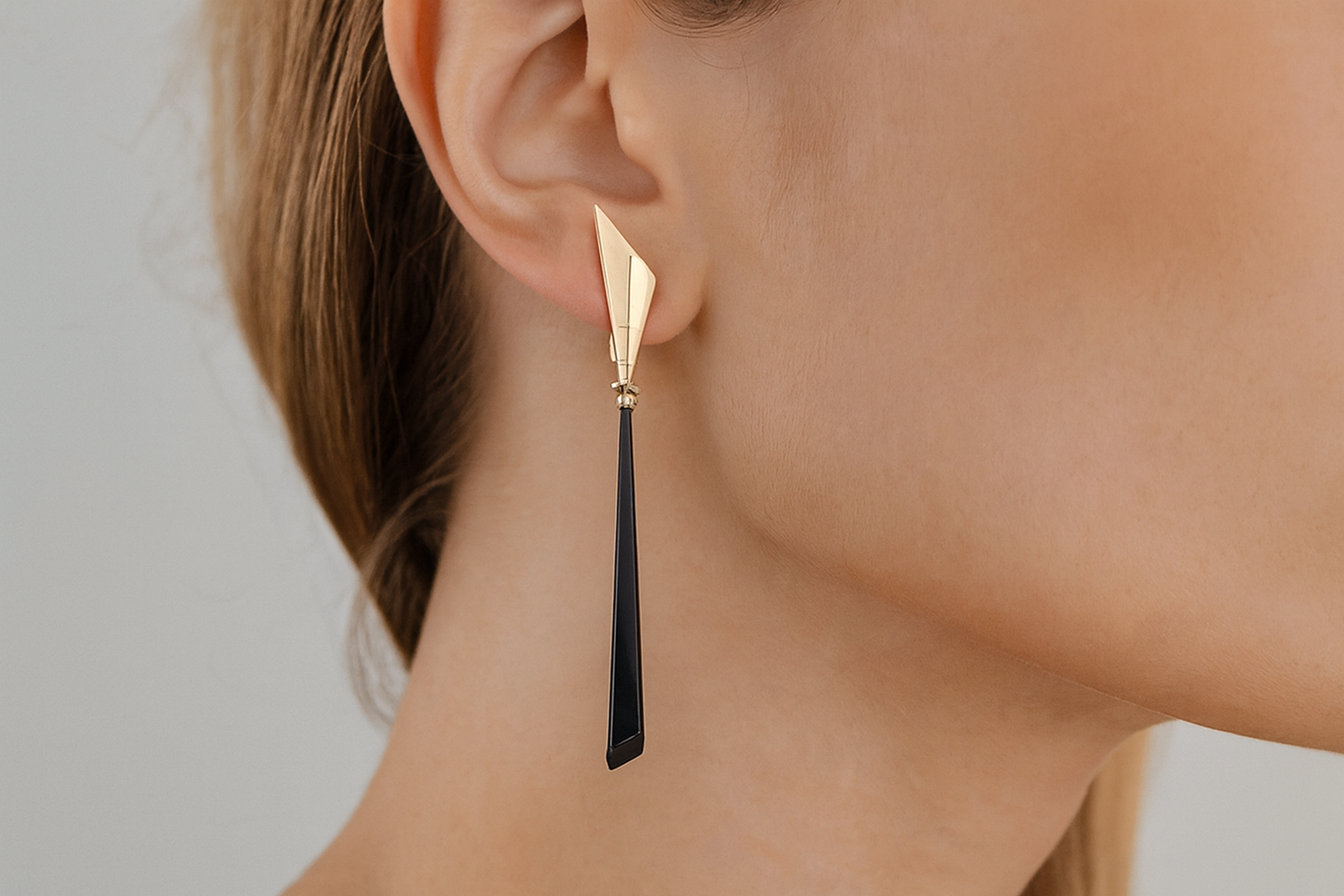 Elegant drop earrings being worn