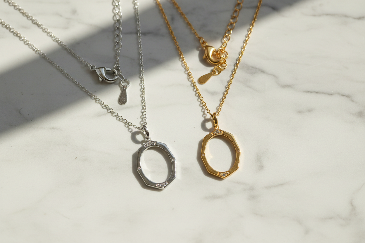 Eterna Gleam Necklace Gold and Silver on Marble