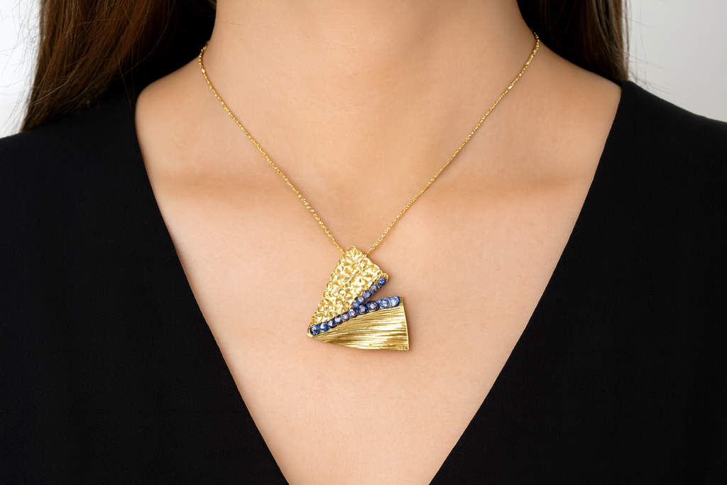 Generated lifestyle image of the geometric gold and blue crystal necklace being worn