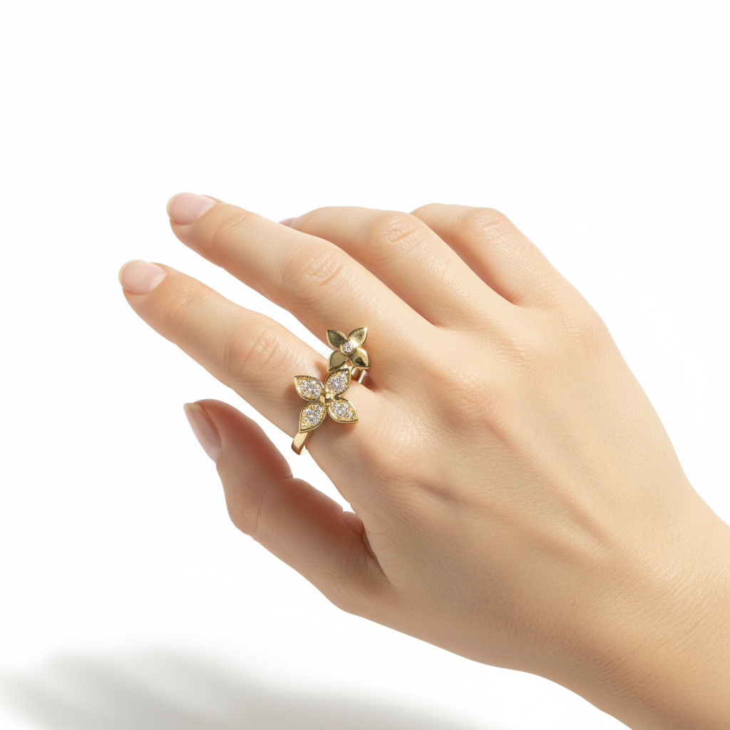 Gold butterfly ring worn on finger - matching product angle