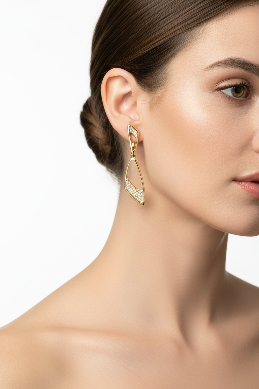 Gold pavé diamond drop earrings on model