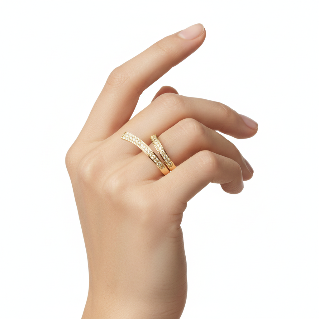 Gold pavé ear cuff worn low on finger