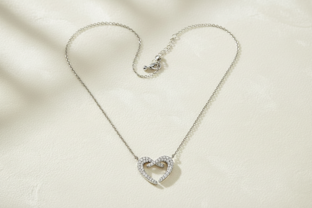 Silver Heart Necklace Flat Lay
