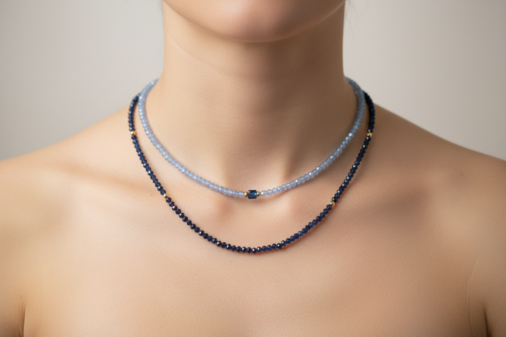 Light Blue and Navy Crystal Necklaces Layered on Neck