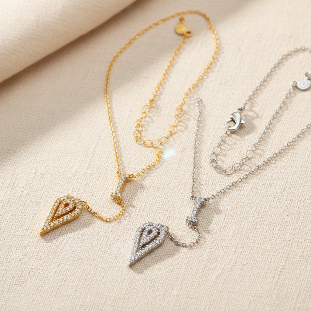 Luxe Dewdrop Necklace Gold & Silver on Cream Linen