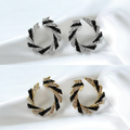 Midnight Swirl Earrings – 4 Earrings on White Fabric