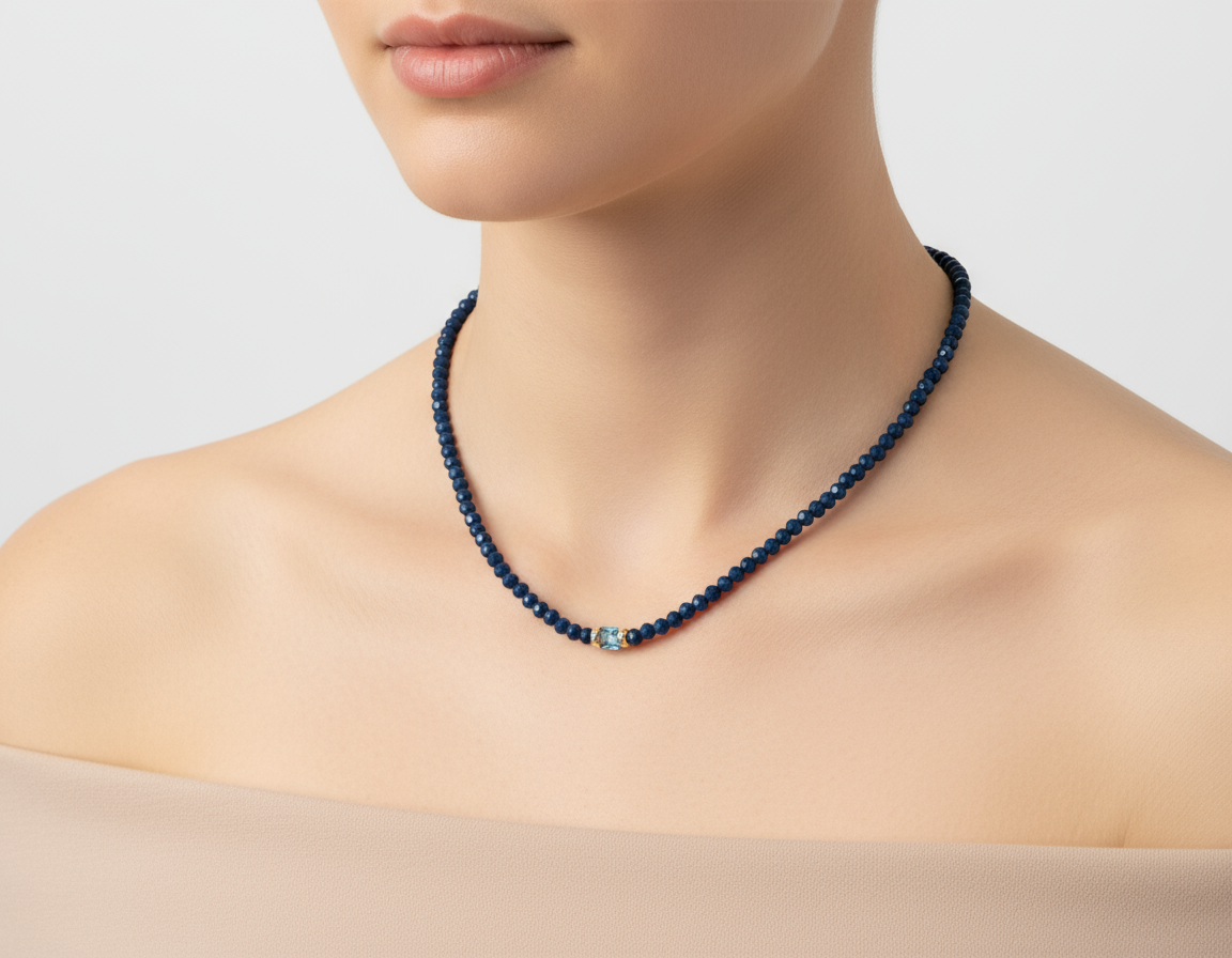 Navy blue beaded necklace on model