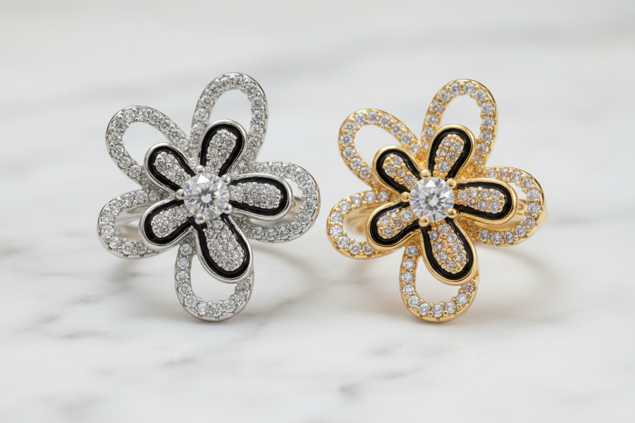 Silver and Gold Radiant Bloom Rings on Marble