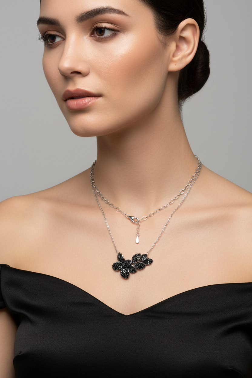 Silver butterfly necklace on model
