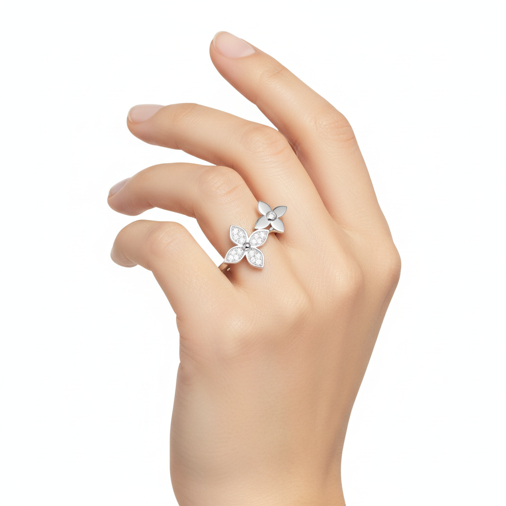 Silver butterfly ring worn on hand