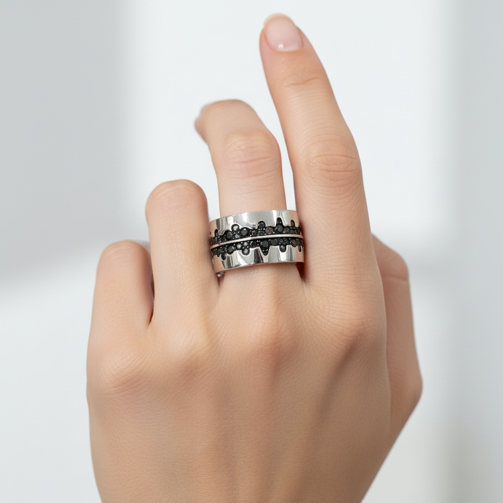 Silver crown lace ring on finger