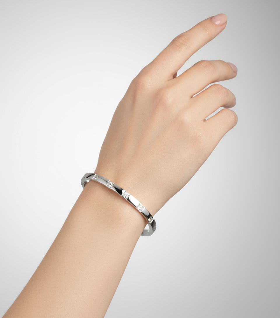 Silver crystal bangle worn on wrist