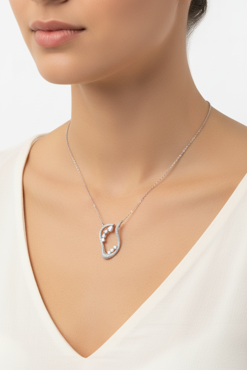 Silver diamond pendant necklace worn on neck