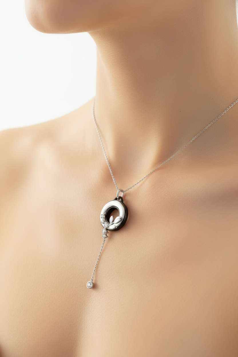 Silver floral pendant necklace worn on neck
