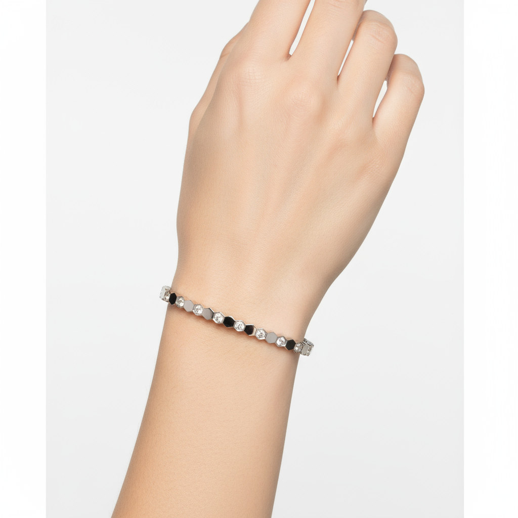 Silver hexagonal bangle on hand model