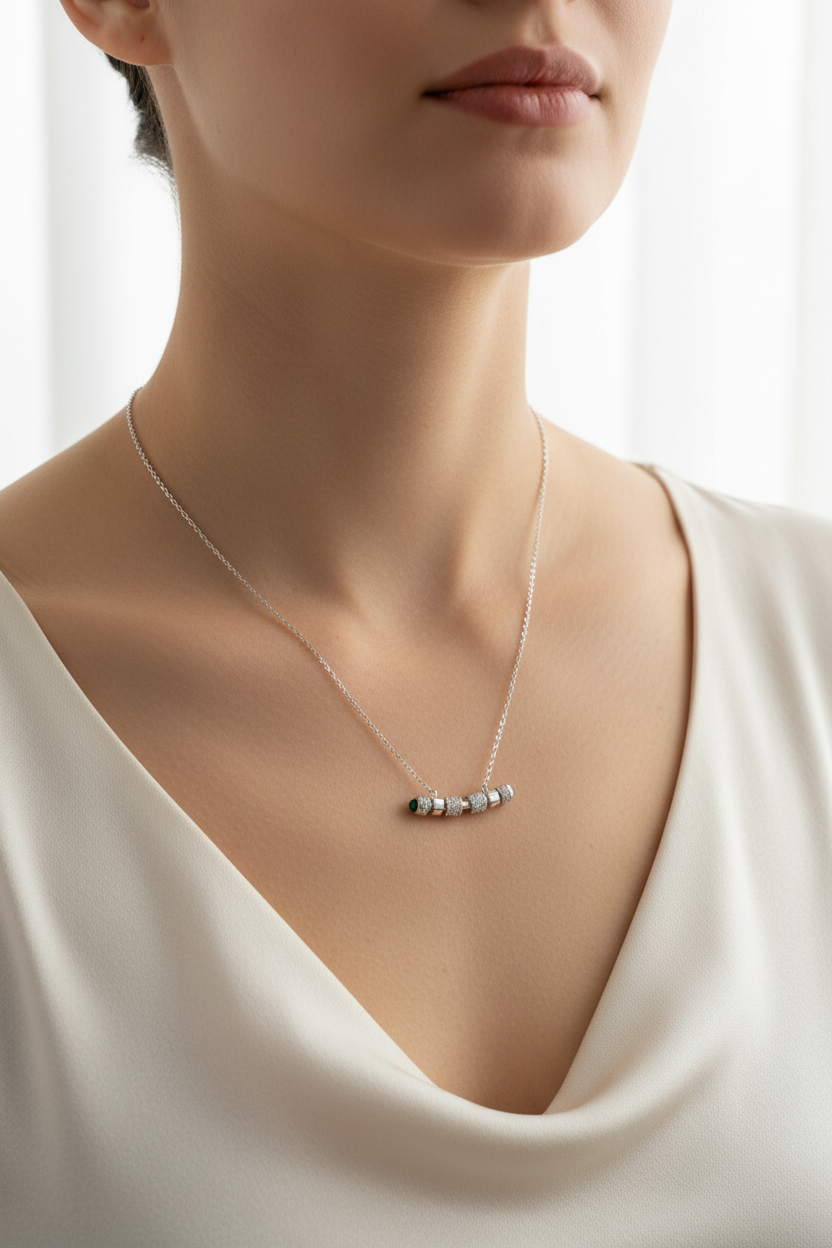 Silver necklace with diamond beads worn on neck