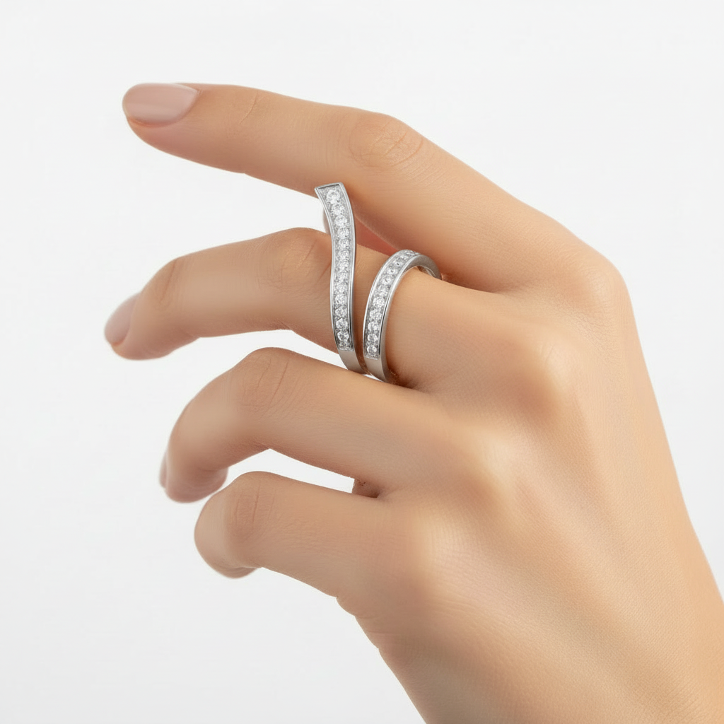 Silver pavé ear cuff worn on finger