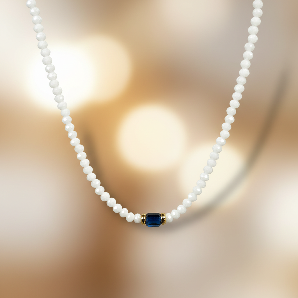 White beaded necklace with elegant background